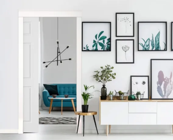 A lounge with pictures on the wall